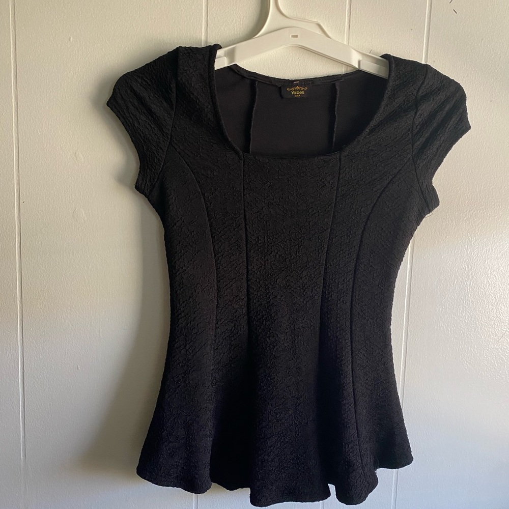 Black textured, huge ribbed float at the bottom top